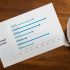 Detailed close-up of global export data on a paper report with a globe.